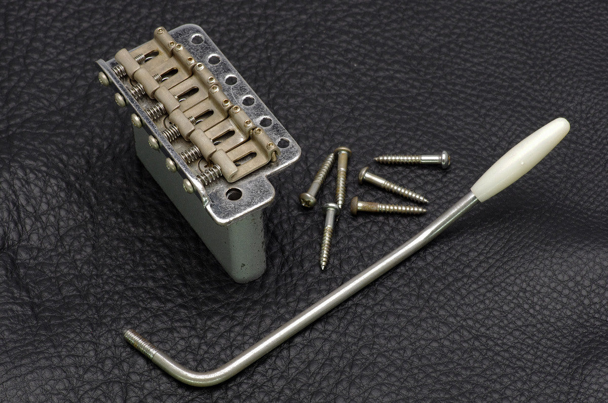 Guitar bridge - Gotoh VT100 vintage style tremolo w short drilled steel block - aged chrome